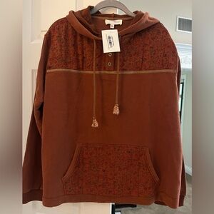 Lovely Melody Rust Hoodie with Floral Design